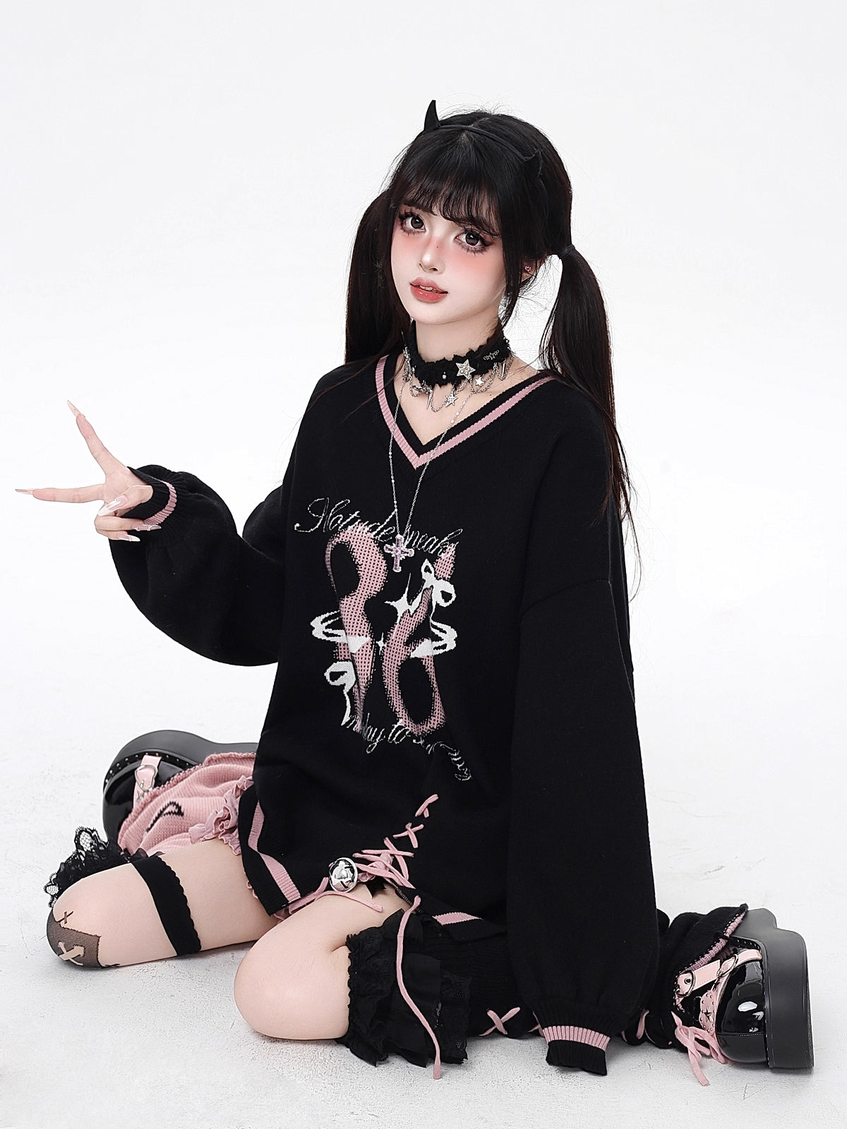 This original preppy-style sweater redefines classic academia with a digital-age twist. The bold black and red color block evokes retro energy, while the customizable lace-up V-neck adds a touch of playful rebellion. Lightweight yet cozy, it's designed for layering or standing alone—a statement piece for those who blend sweetness and subversion effortlessly.