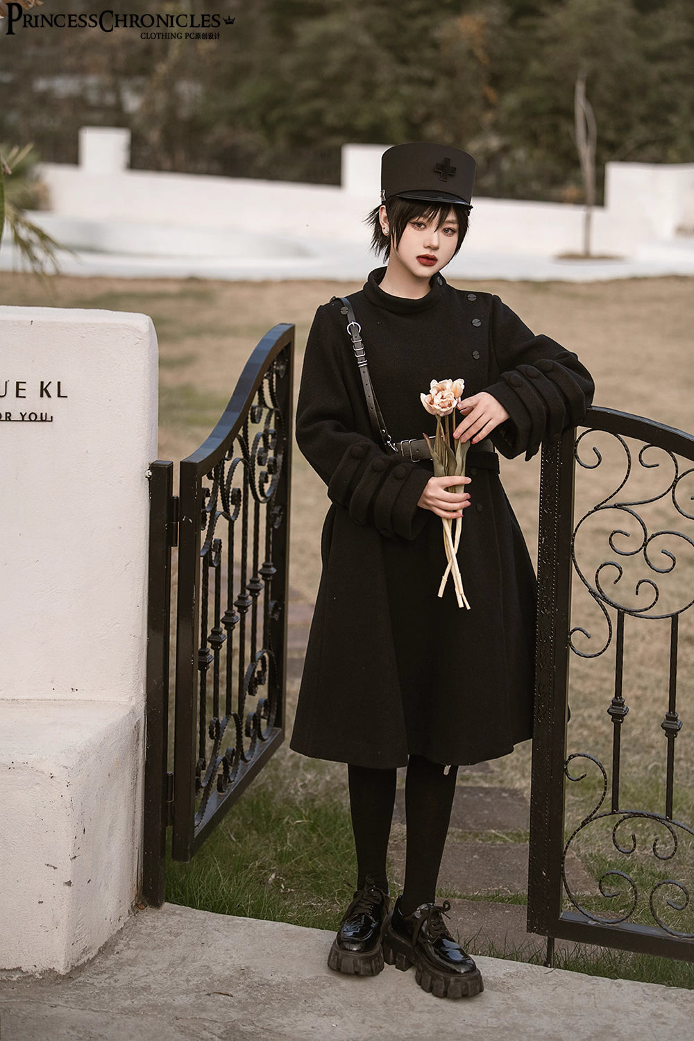 Inspired by the silent majesty of winter woods, this coat combines sharp tailoring with organic elegance. The sleek black wool blend contours the silhouette with minimalist precision, while architectural lines and a mid-length cut evoke modern resilience. Functional details like deep pockets and a structured collar blend practicality with poetic cold-weather sophistication—for those who command the urban landscape with serene strength.
