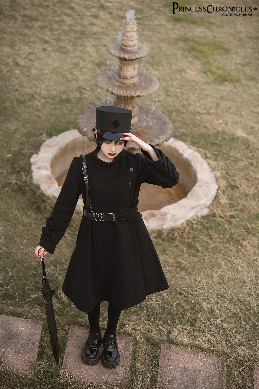 Inspired by the silent majesty of winter woods, this coat combines sharp tailoring with organic elegance. The sleek black wool blend contours the silhouette with minimalist precision, while architectural lines and a mid-length cut evoke modern resilience. Functional details like deep pockets and a structured collar blend practicality with poetic cold-weather sophistication—for those who command the urban landscape with serene strength.