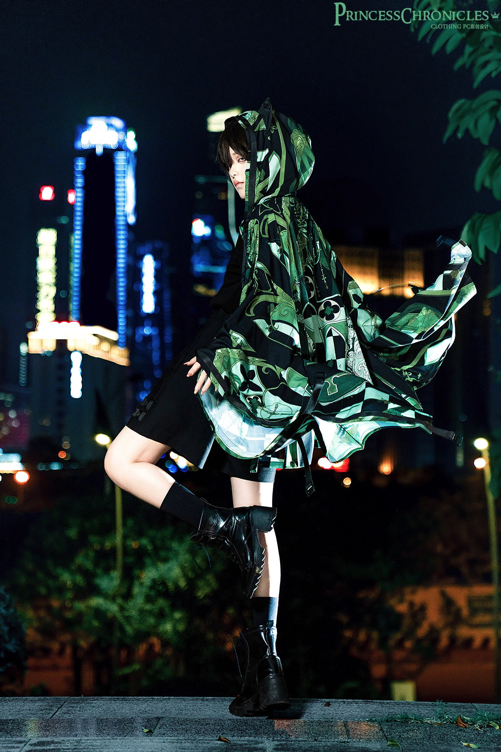 This coat merges Lolita’s classic silhouette with cyberpunk’s dystopian edge. Structured shoulders and a tailored waist contrast with tactical harness details and glitch-art graphic prints. Crafted from heavy-duty wool blend, it features metallic hardware and neon accent stitching, blending Victorian elegance with futuristic rebellion. Designed for commanding presence in both digital and urban landscapes, it embodies a fusion of dark romance and tech-driven defiance.