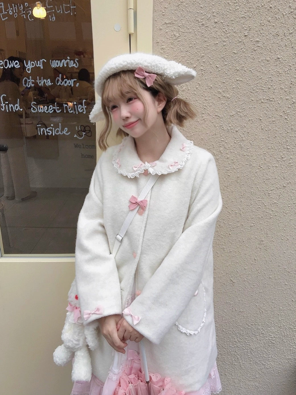 The Pink and White Vintage Lolita Winter Coat is designed to bring warmth and sweetness to the cold season. Crafted with a soft, cozy texture, it features delicate bow accents and a retro-inspired silhouette that highlights a girlish charm. The pastel pink and white tones add a dreamy, cute touch, perfect for creating a fairytale-like winter look. Both stylish and practical, this coat embodies the essence of sweet Lolita elegance and coziness.