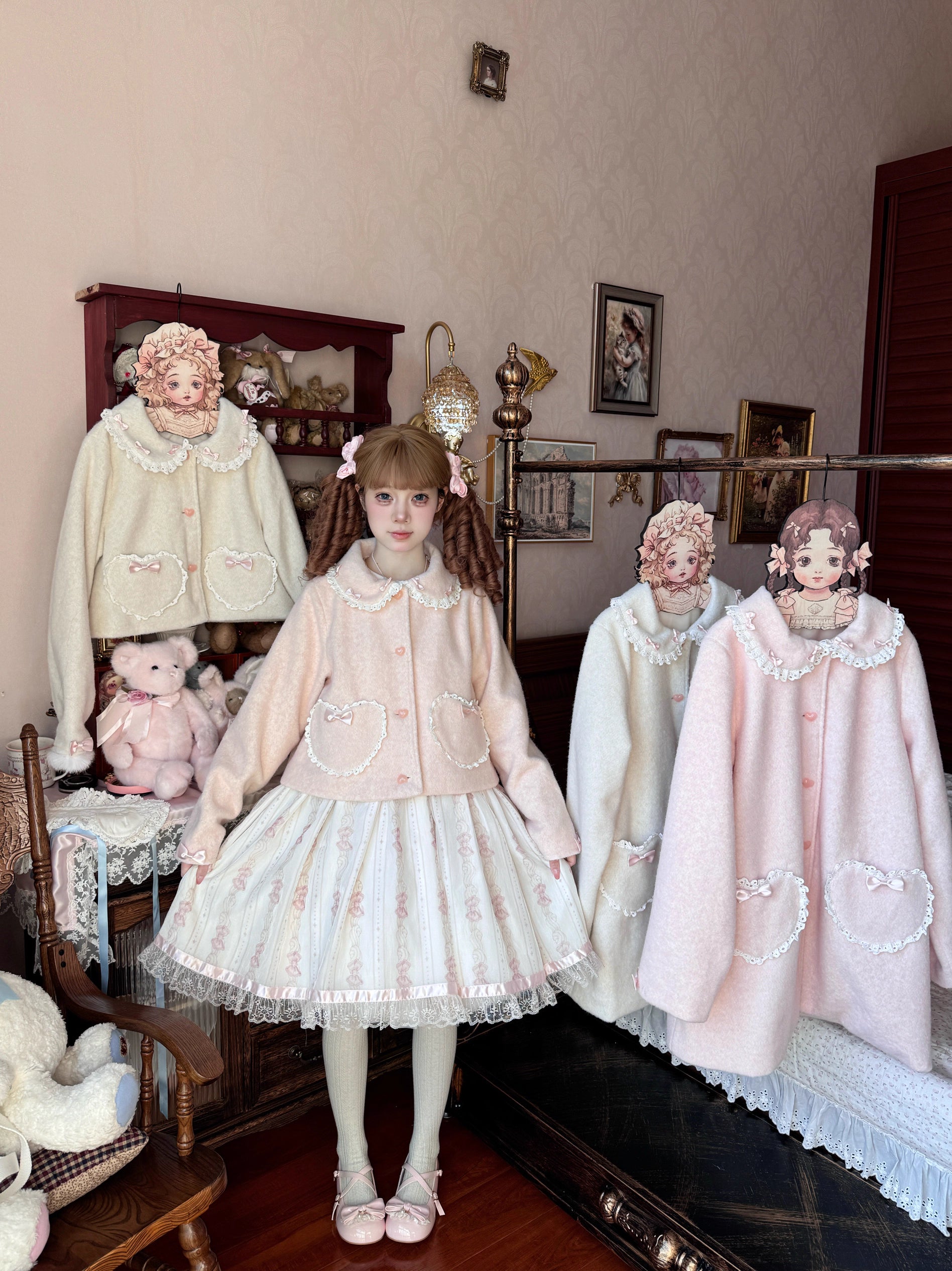 The Pink and White Vintage Lolita Winter Coat is designed to bring warmth and sweetness to the cold season. Crafted with a soft, cozy texture, it features delicate bow accents and a retro-inspired silhouette that highlights a girlish charm. The pastel pink and white tones add a dreamy, cute touch, perfect for creating a fairytale-like winter look. Both stylish and practical, this coat embodies the essence of sweet Lolita elegance and coziness.
