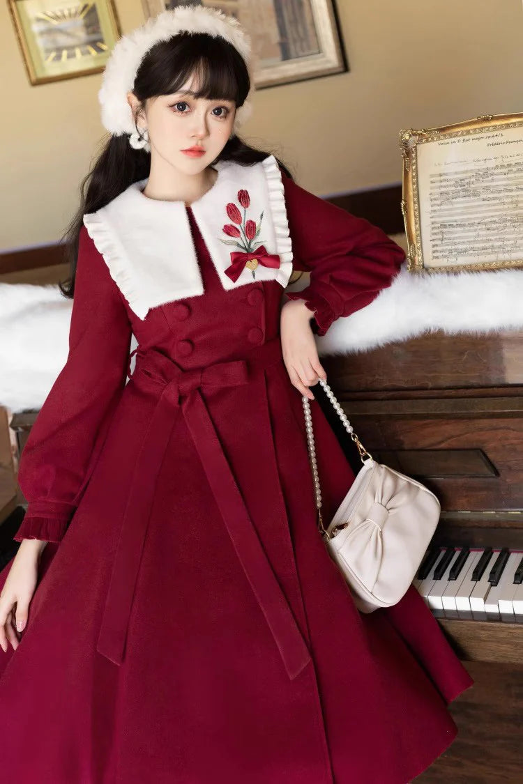 "Blooming in Frost"&nbsp;— Inspired by the bold beauty of tulips piercing through winter soil, this coat dress symbolizes resilience and romance. The vibrant crimson hue echoes the flower’s velvety petals, while intricate embroidery captures the delicate curvature of stems and leaves, merging botanical artistry with Lolita elegance.