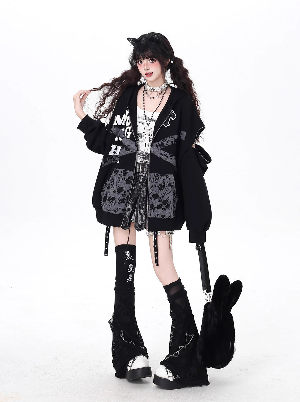 Raw-edged and rebellious, this hoodie features a distressed破洞 design and an original kitten graphic, channeling underground alt youth culture. The oversized fit and muted grey-black palette keep it effortlessly cool, while soft brushed fleece offers cozy comfort. For those who wear their attitude on their sleeve—literally.