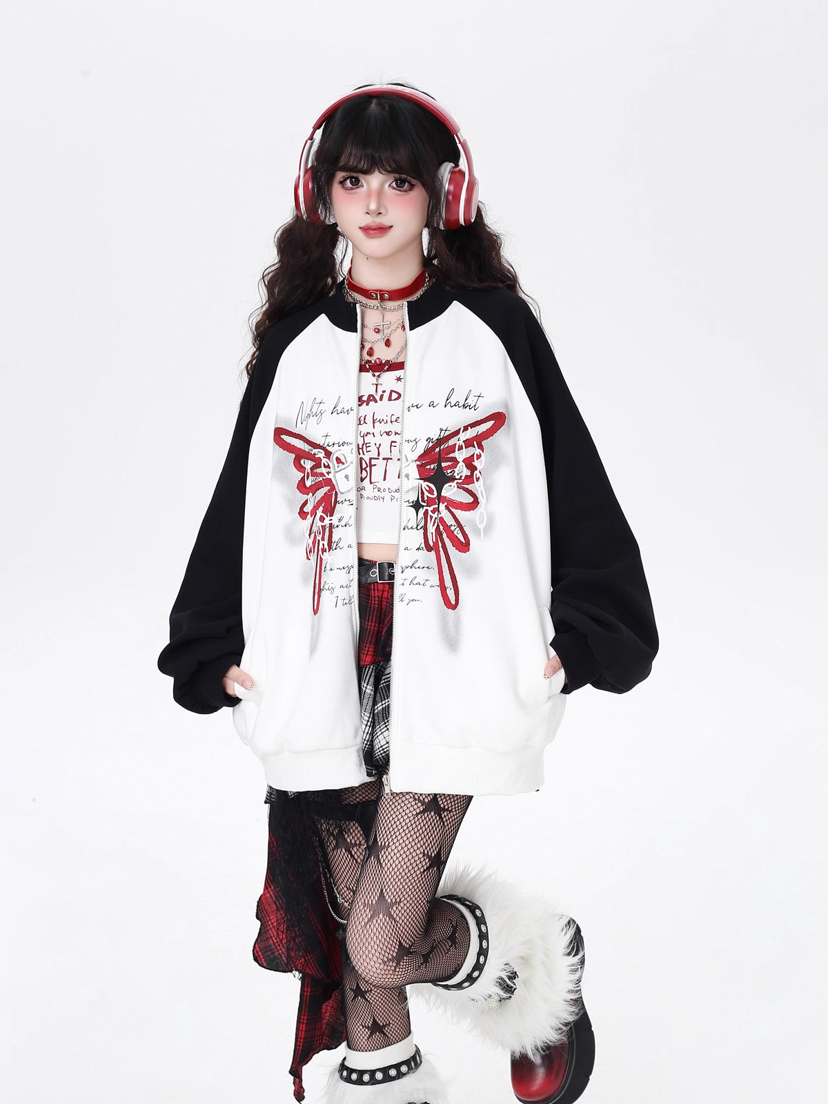 Edgy yet romantic, this coat features a bold high neckline and striking black-and-white color blocking. The oversized cut offers effortless cool, while subtle floral motifs hint at delicate rebellion. Perfect for layering in transitional weather, it embodies a blend of toughness and tenderness. For the dreamer with a rebellious heart.