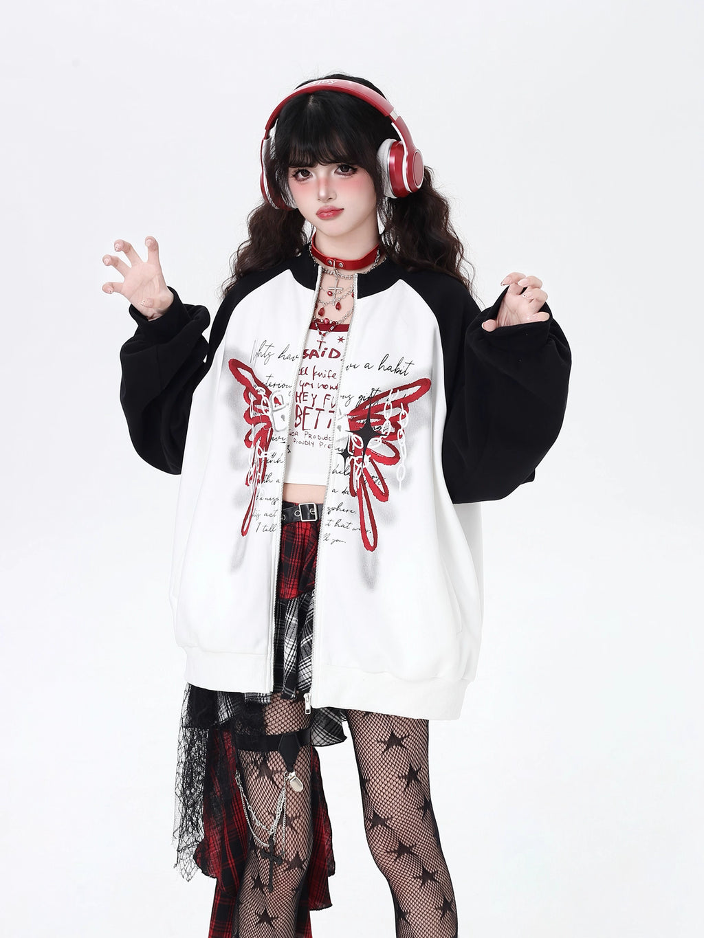 Edgy yet romantic, this coat features a bold high neckline and striking black-and-white color blocking. The oversized cut offers effortless cool, while subtle floral motifs hint at delicate rebellion. Perfect for layering in transitional weather, it embodies a blend of toughness and tenderness. For the dreamer with a rebellious heart.