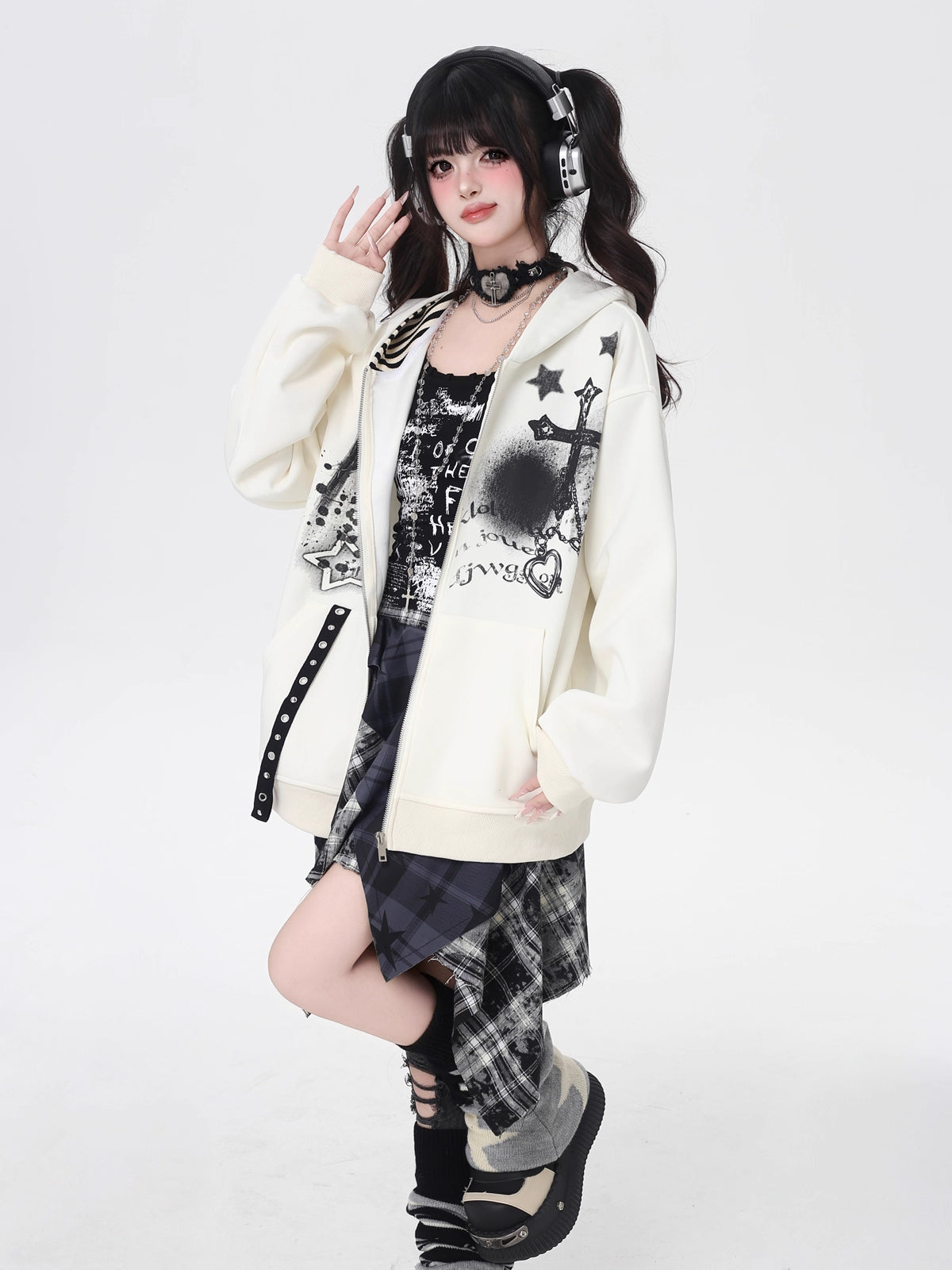A soft take on dark aesthetics, this hoodie blends subtle gothic charm with effortless streetwear style. Delicate lace-like detailing and a versatile zip-front design create a layered look, while the relaxed fit and muted blue/beige tones keep it wearable and fresh. Lightweight for early autumn, it layers seamlessly over bras, tanks, or dresses—for those who express their edge with subtlety and grace.