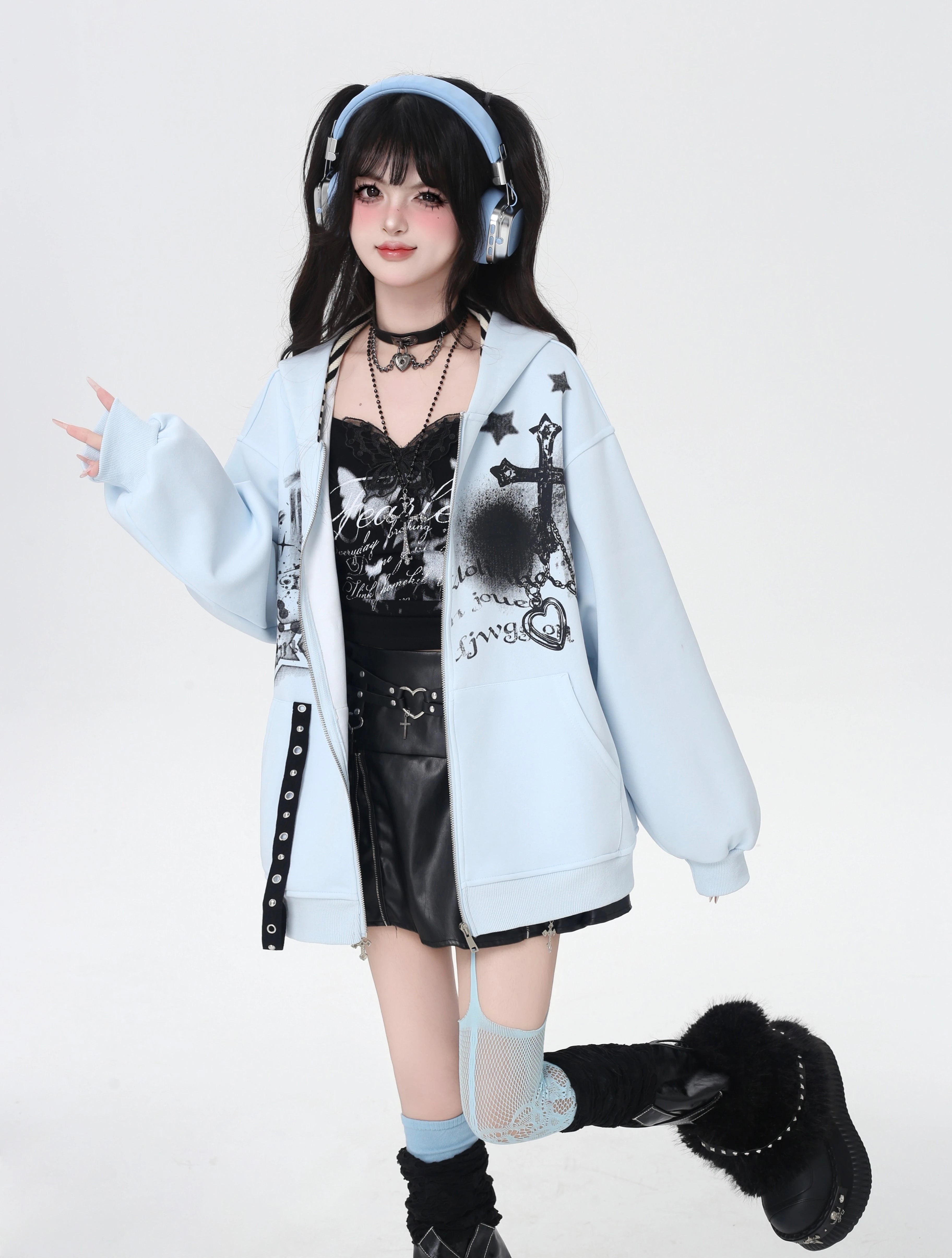 A soft take on dark aesthetics, this hoodie blends subtle gothic charm with effortless streetwear style. Delicate lace-like detailing and a versatile zip-front design create a layered look, while the relaxed fit and muted blue/beige tones keep it wearable and fresh. Lightweight for early autumn, it layers seamlessly over bras, tanks, or dresses—for those who express their edge with subtlety and grace.