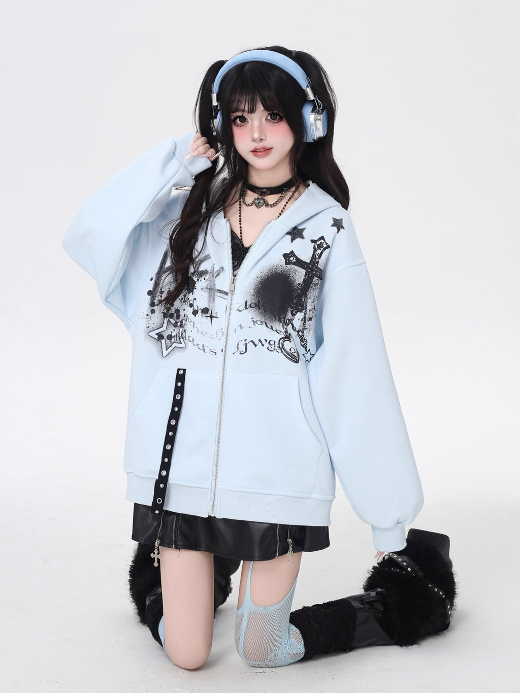 A soft take on dark aesthetics, this hoodie blends subtle gothic charm with effortless streetwear style. Delicate lace-like detailing and a versatile zip-front design create a layered look, while the relaxed fit and muted blue/beige tones keep it wearable and fresh. Lightweight for early autumn, it layers seamlessly over bras, tanks, or dresses—for those who express their edge with subtlety and grace.
