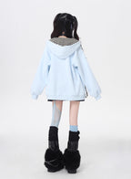 A soft take on dark aesthetics, this hoodie blends subtle gothic charm with effortless streetwear style. Delicate lace-like detailing and a versatile zip-front design create a layered look, while the relaxed fit and muted blue/beige tones keep it wearable and fresh. Lightweight for early autumn, it layers seamlessly over bras, tanks, or dresses—for those who express their edge with subtlety and grace.