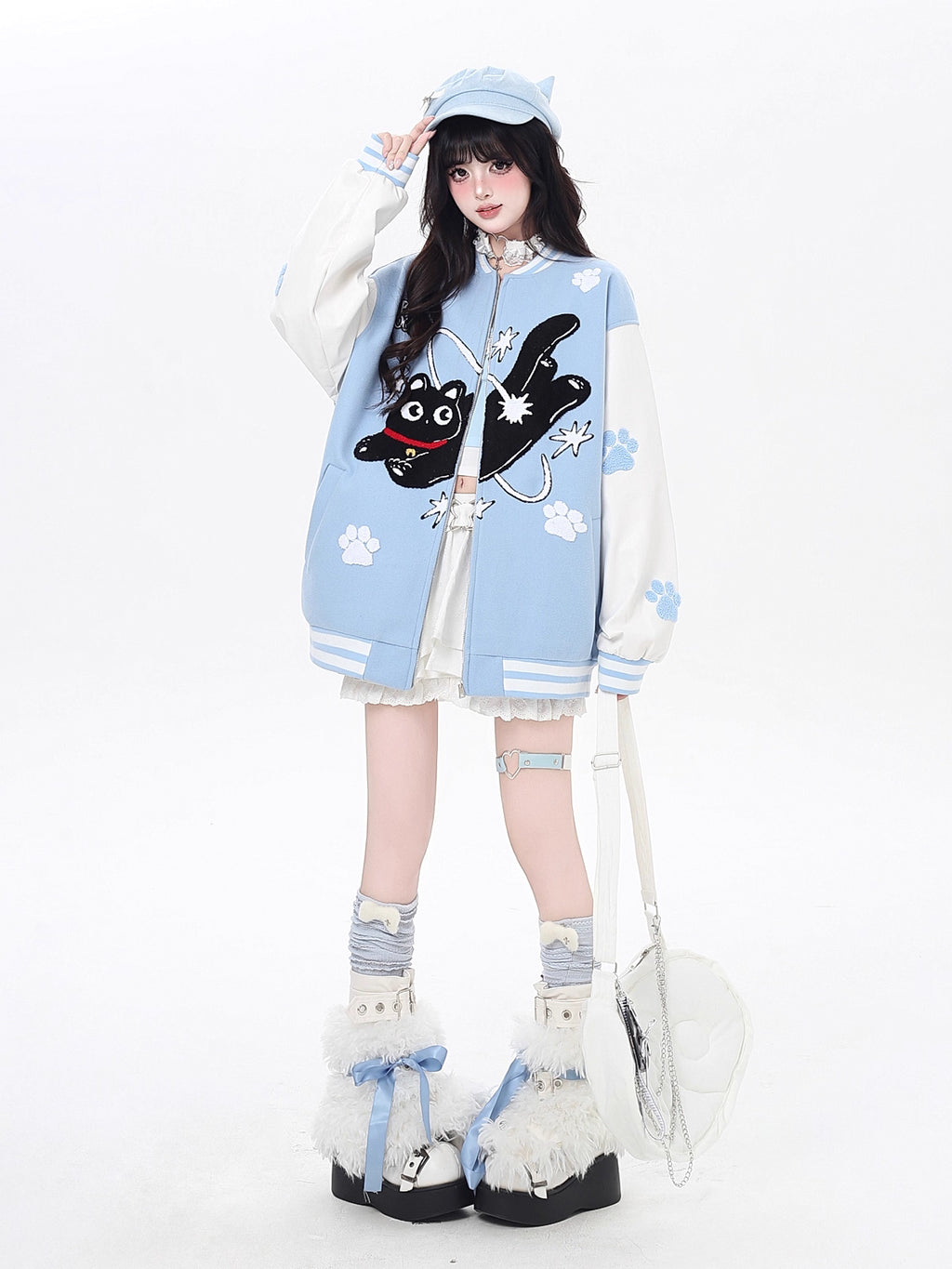 Inspired by cosmic curiosity and urban style, this baseball jacket combines celestial cat embroidery with bold color-blocking. The relaxed fit and soft fabric offer comfort with a rebellious edge, perfect for day-to-night versatility. A statement piece for those who love playful yet cool aesthetics.