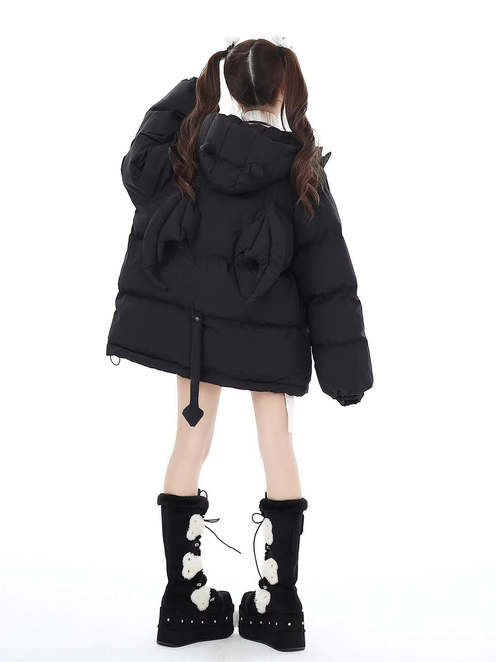 This bold winter jacket blends playful sweetness with rebellious edge. Featuring a striking 3D devil motif and plush oversized silhouette, it delivers both warmth and attitude. The deep hood, soft padding, and included devil-themed crossbody bag create a cohesive, street-ready look. Perfect for expressing your unique mix of cute and cool during the cold season.
