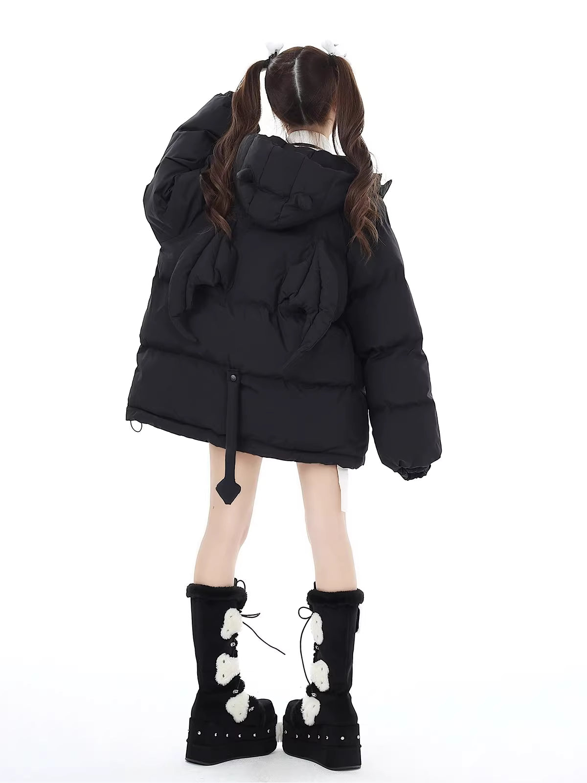 This bold winter jacket blends playful sweetness with rebellious edge. Featuring a striking 3D devil motif and plush oversized silhouette, it delivers both warmth and attitude. The deep hood, soft padding, and included devil-themed crossbody bag create a cohesive, street-ready look. Perfect for expressing your unique mix of cute and cool during the cold season.