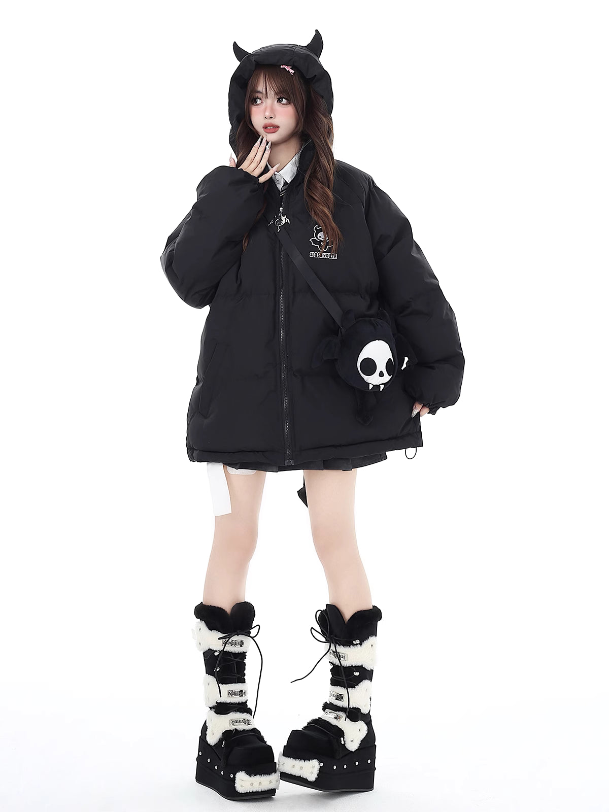 This bold winter jacket blends playful sweetness with rebellious edge. Featuring a striking 3D devil motif and plush oversized silhouette, it delivers both warmth and attitude. The deep hood, soft padding, and included devil-themed crossbody bag create a cohesive, street-ready look. Perfect for expressing your unique mix of cute and cool during the cold season.