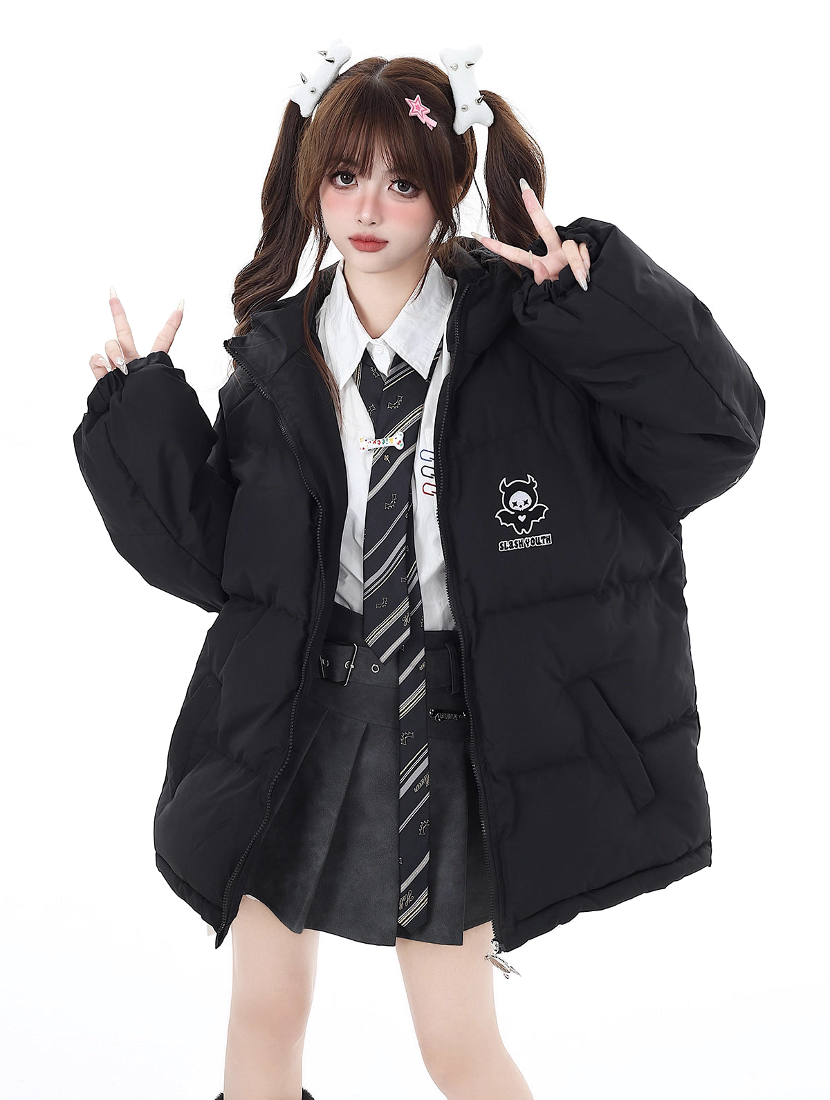This bold winter jacket blends playful sweetness with rebellious edge. Featuring a striking 3D devil motif and plush oversized silhouette, it delivers both warmth and attitude. The deep hood, soft padding, and included devil-themed crossbody bag create a cohesive, street-ready look. Perfect for expressing your unique mix of cute and cool during the cold season.