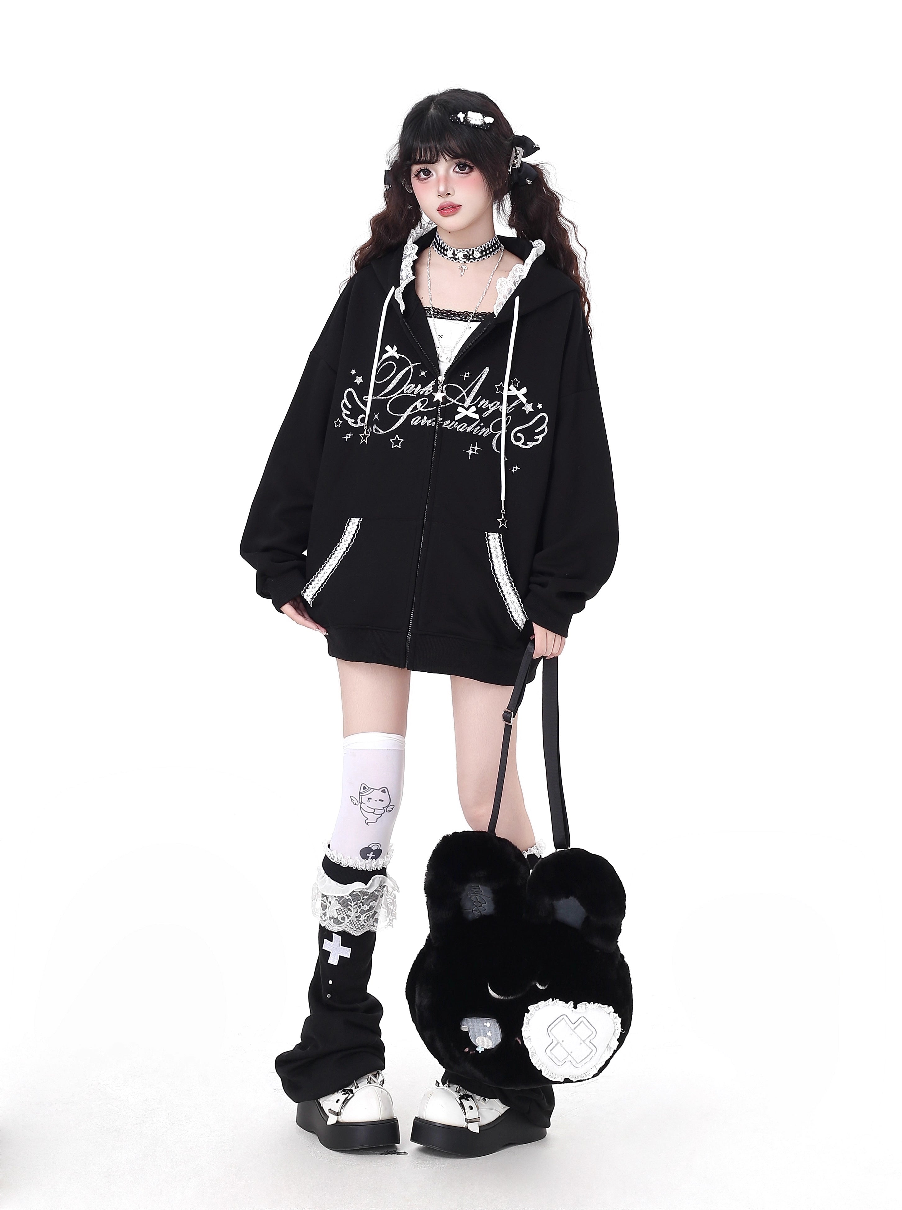 Blending streetwear ease with delicate charm, this hoodie features soft lace accents and a relaxed oversized fit. The playful pink, black, and blue color-blocking adds youthful energy, while the cozy fabric ensures comfort. Perfect for layering, it subtly merges softness with urban casual style.