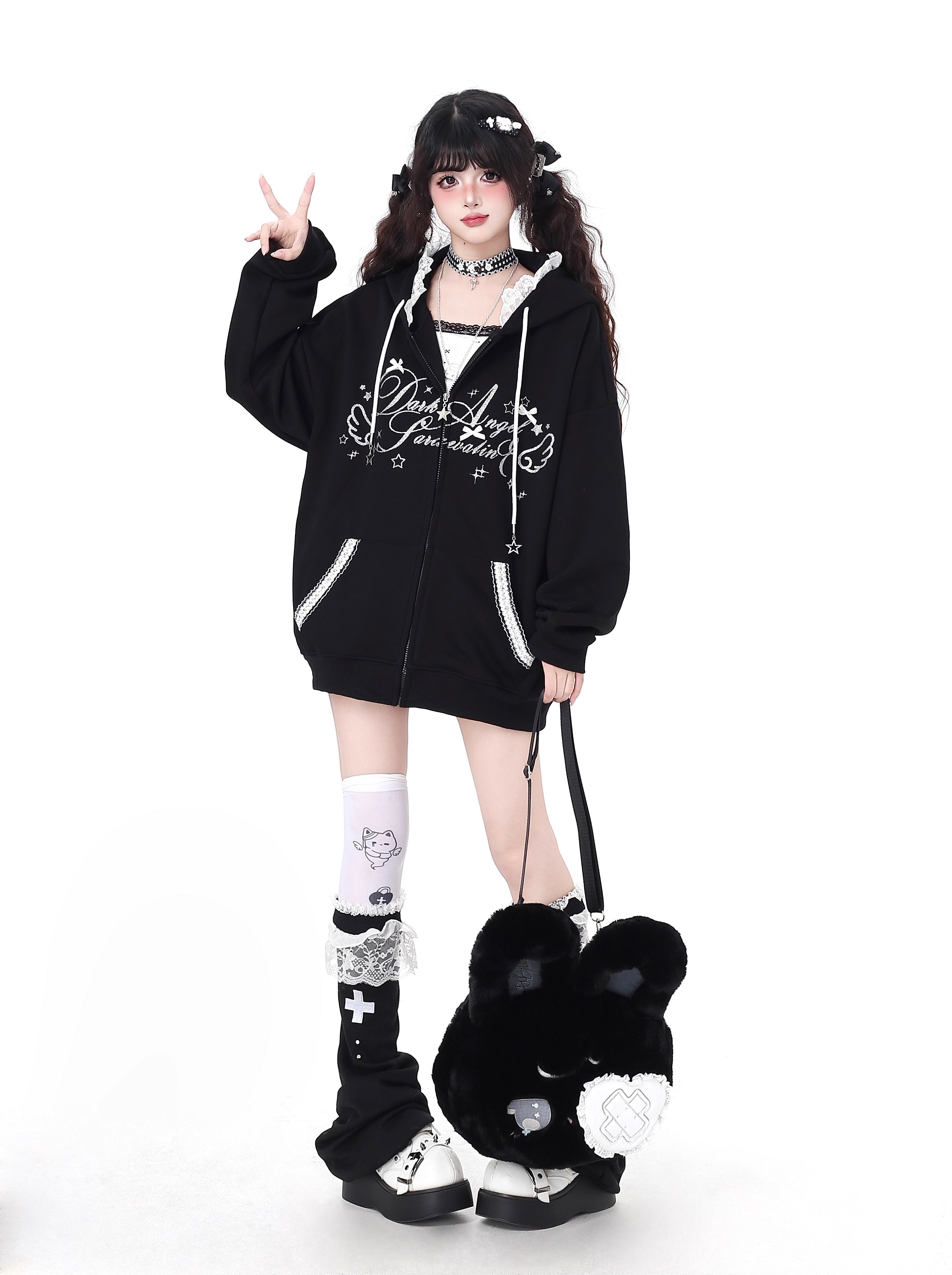 Blending streetwear ease with delicate charm, this hoodie features soft lace accents and a relaxed oversized fit. The playful pink, black, and blue color-blocking adds youthful energy, while the cozy fabric ensures comfort. Perfect for layering, it subtly merges softness with urban casual style.
