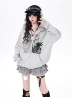 Mixing retro aesthetics with modern functionality, this hoodie features a removable faux fur-lined hood for versatile styling. The oversized cut and neutral grey-white palette offer effortless urban vibes, while brushed fleece interior ensures cozy warmth. Ideal for expressing low-key, laid-back street style with a nostalgic twist.