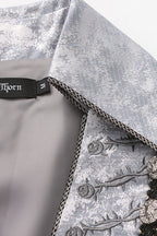 Inspired by the fusion of Victorian elegance and industrial steam-powered innovation, this coat reimagines aristocratic tailoring with avant-garde Lolita aesthetics. The sleeveless design emphasizes structured shoulders and a sharp silhouette, evoking the commanding presence of a fantasy prince. Details like faux gear motifs and metallic accents pay homage to steampunk craftsmanship, while the grey wool blend fabric bridges classic sophistication and futuristic charm.