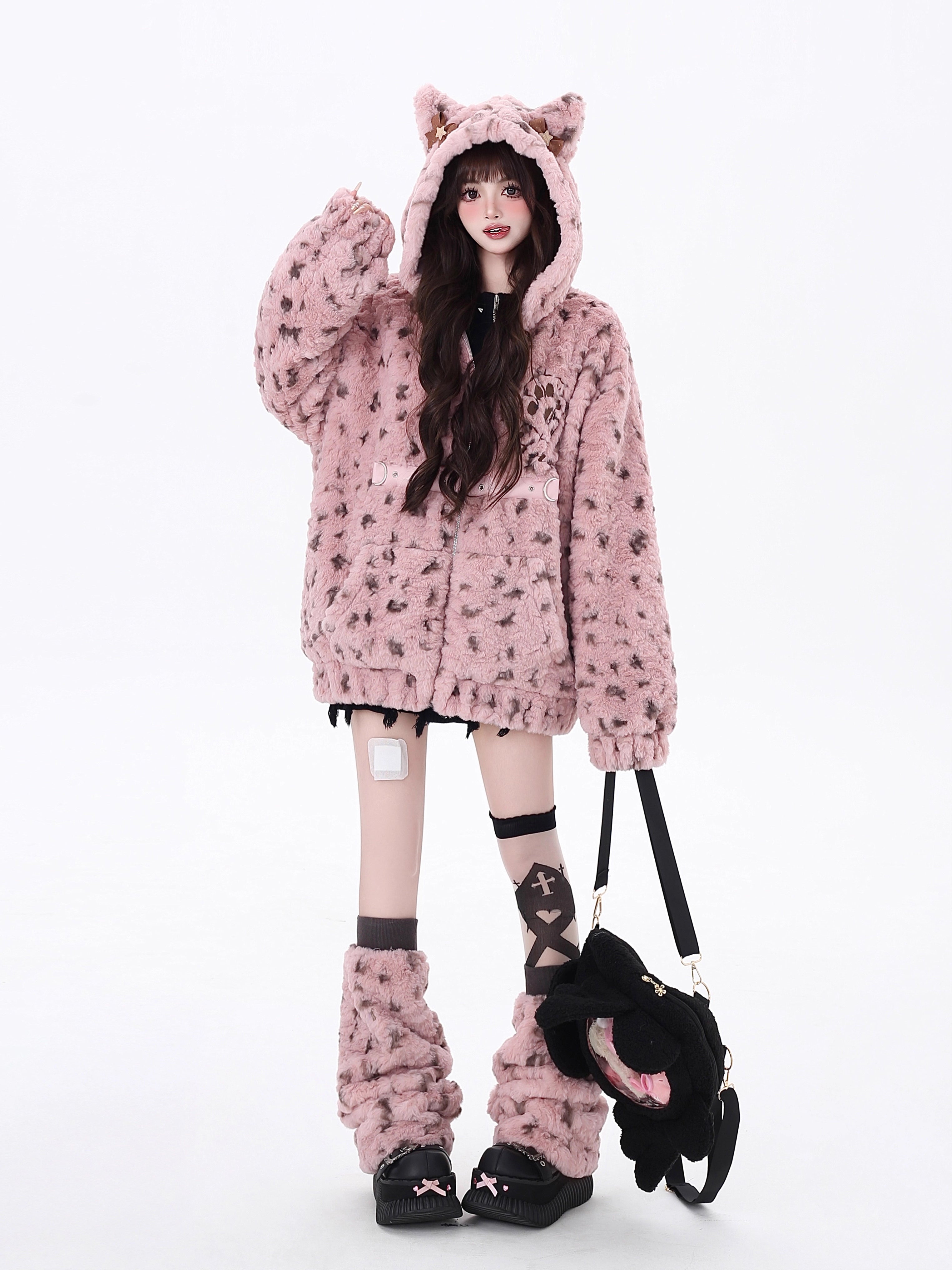 Bold and sweet collide in this original leopard-print sherpa jacket. Plush fluffy fabric meets a playful pink colorway, while the oversized cut and wild pattern express a fearless, feminine charm. Designed for those who crave warmth without sacrificing style—soft on the outside, untamed within.