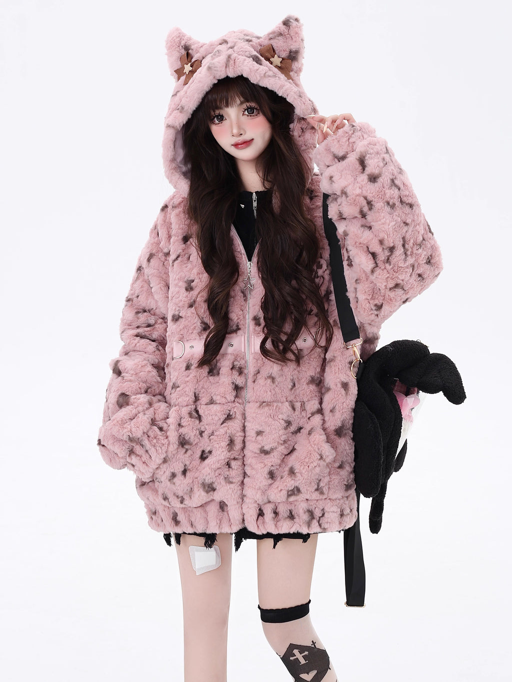 Bold and sweet collide in this original leopard-print sherpa jacket. Plush fluffy fabric meets a playful pink colorway, while the oversized cut and wild pattern express a fearless, feminine charm. Designed for those who crave warmth without sacrificing style—soft on the outside, untamed within.