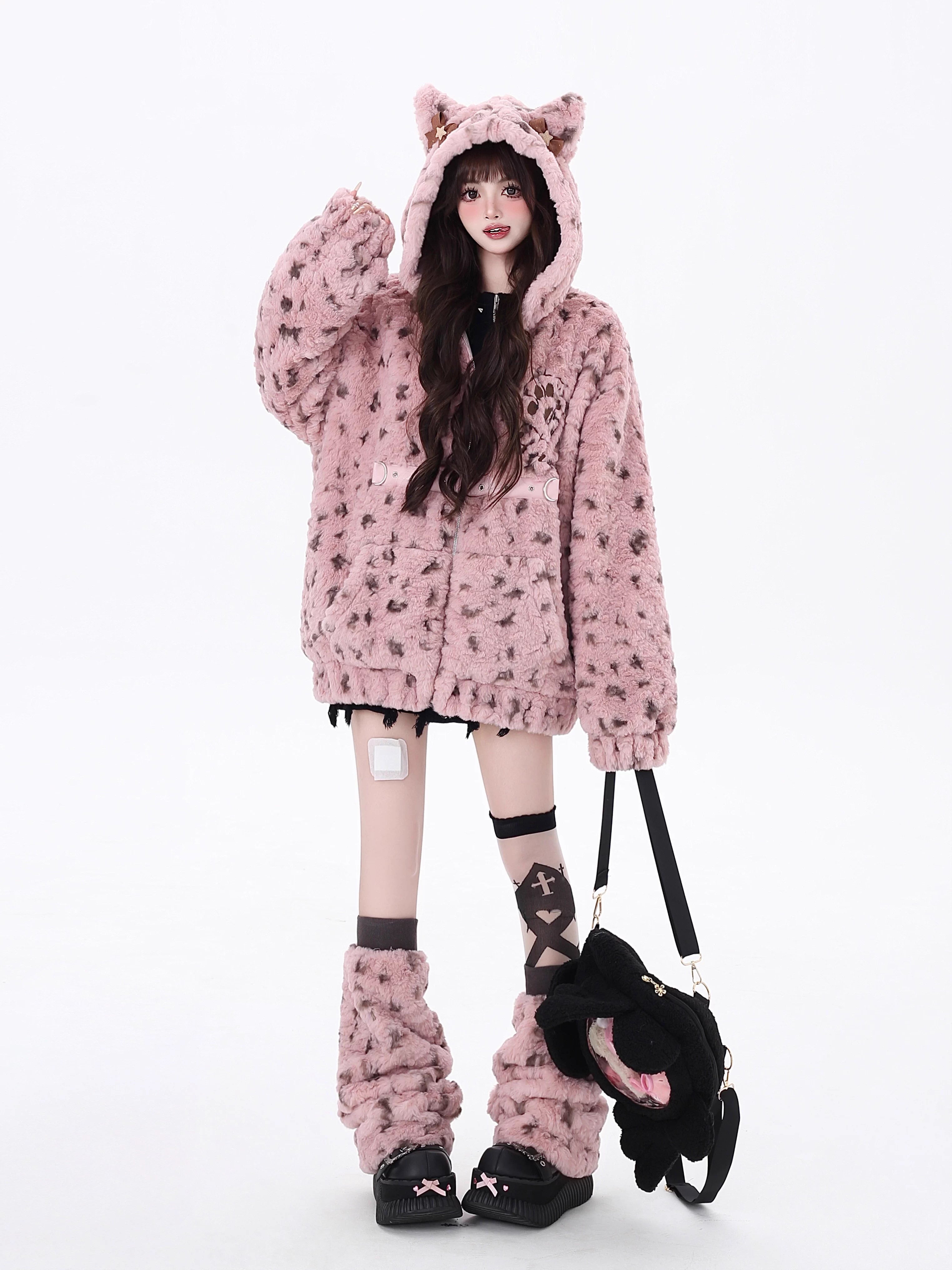 Bold and sweet collide in this original leopard-print sherpa jacket. Plush fluffy fabric meets a playful pink colorway, while the oversized cut and wild pattern express a fearless, feminine charm. Designed for those who crave warmth without sacrificing style—soft on the outside, untamed within.
