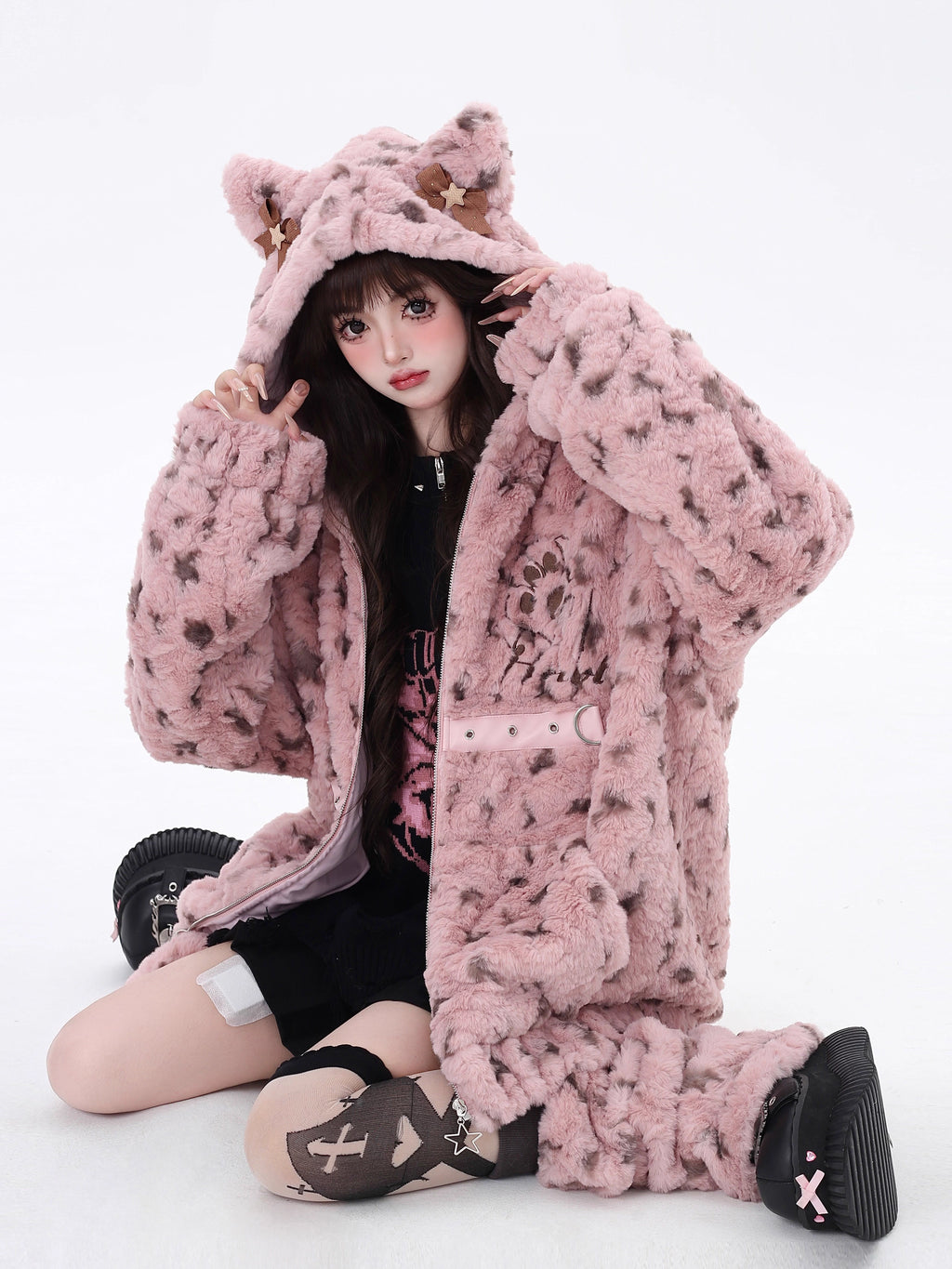 Bold and sweet collide in this original leopard-print sherpa jacket. Plush fluffy fabric meets a playful pink colorway, while the oversized cut and wild pattern express a fearless, feminine charm. Designed for those who crave warmth without sacrificing style—soft on the outside, untamed within.