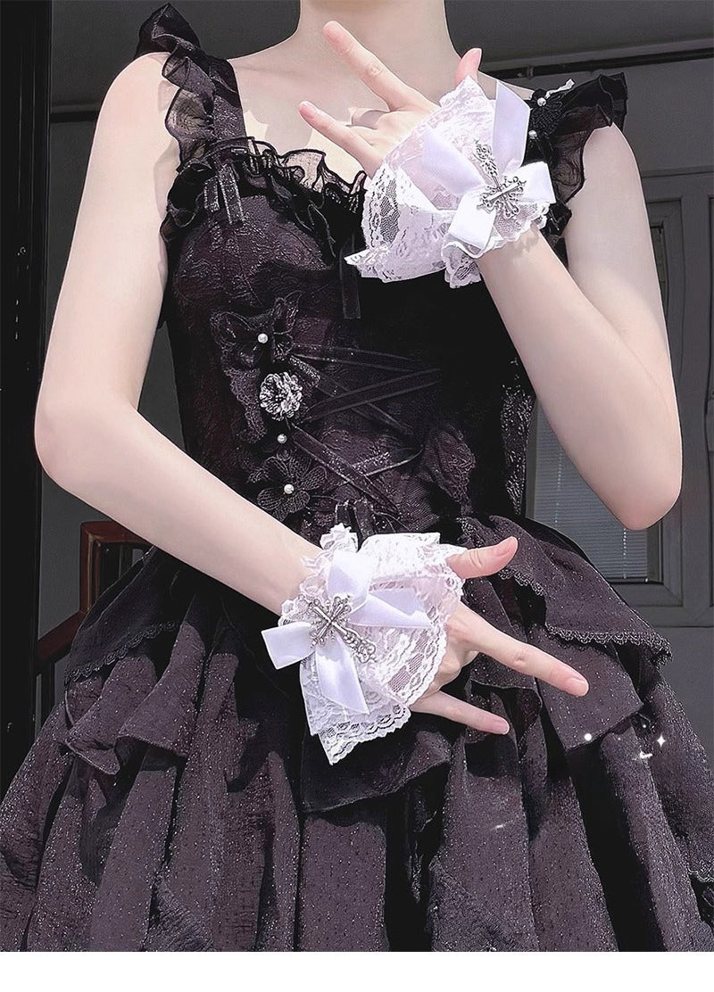 Inspired by the sweet-gothic fusion in Lolita fashion, these arm sleeves blend sacred symbolism and playful elegance. Delicate lace, satin bows, and striking cross motifs create a balance of innocence and rebellion. The black-and-white palette enhances the classic&nbsp; (sweet-edgy) aesthetic, perfect for adding a touch of devotional charm to Gothic Lolita coordinates or Y2K-inspired street style.