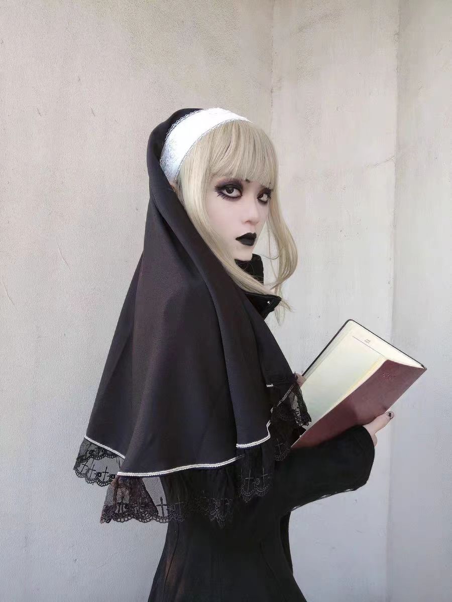 This striking headwear merges ecclesiastical elegance with punk rebellion. The adjustable elastic band ensures comfort, while the stark black-and-white veil creates dramatic draping. Perfect for adding sacred-edgy contrast to Gothic Lolita coordinations or avant-garde fashion statements. Its minimalist design embodies dark sophistication with a rebellious spirit.