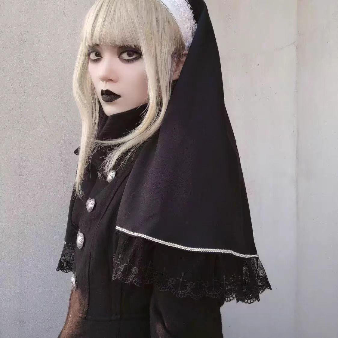 This striking headwear merges ecclesiastical elegance with punk rebellion. The adjustable elastic band ensures comfort, while the stark black-and-white veil creates dramatic draping. Perfect for adding sacred-edgy contrast to Gothic Lolita coordinations or avant-garde fashion statements. Its minimalist design embodies dark sophistication with a rebellious spirit.