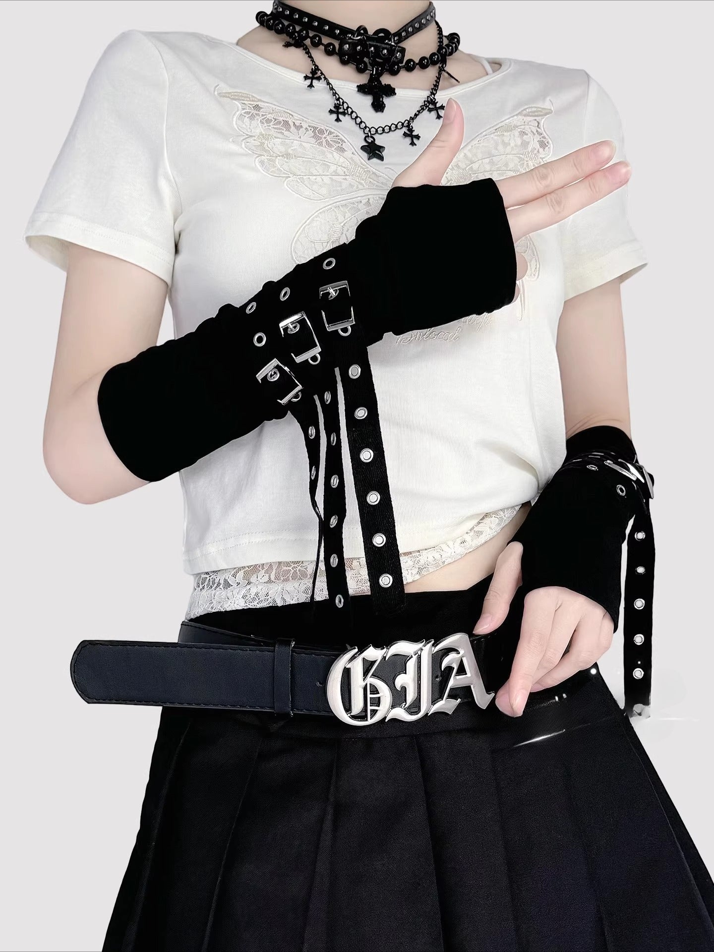Design Concept:
Inspired by the rebellious fusion of punk and Y2K subcultures, these arm sleeves exude edgy allure. Crafted from sheer mesh with strategic strap details and bold buckle accents, they blend provocative style with lightweight comfort. Perfect for concerts, cosplay events, or streetwear statements, they add instant attitude to goth, JK, or cyberpunk outfits, celebrating dark glamour and individual expression.