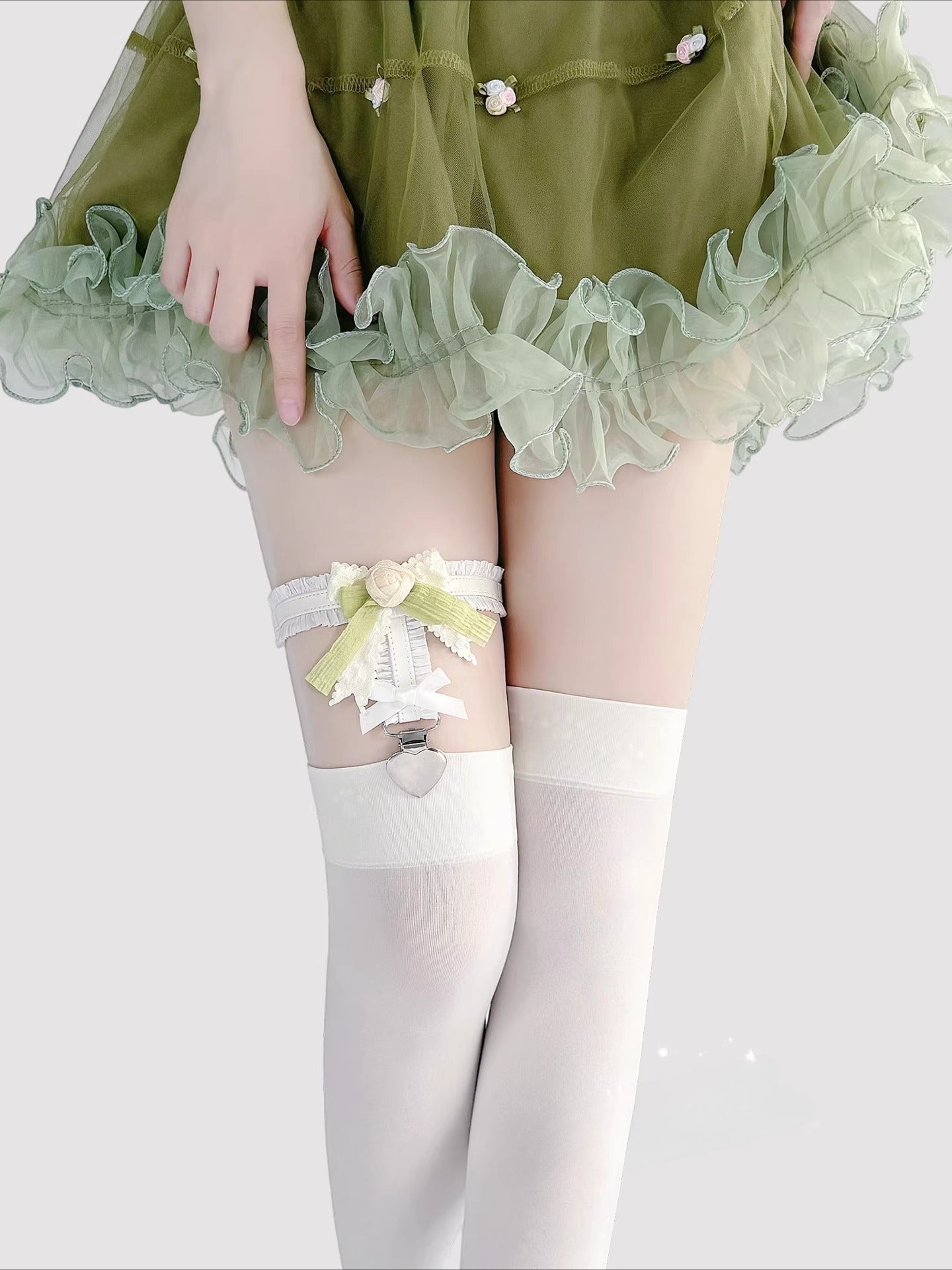Inspired by the delicate details of Lolita fashion, this garter combines fantasy and function. Soft elastic fabric adorned with intricate lace, a dainty rose, and a satin bow creates a romantic yet playful accessory. The adjustable design and anti-slip grip ensure comfort and security, perfect for adding a touch of whimsical elegance to Lolita coordinates, cosplay outfits, or vintage-inspired ensembles.