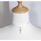 This Cross Lace Choker Necklace blends Gothic elegance with Lolita sweetness. Decorated with delicate lace and a central cross pendant, it exudes both mystery and charm. Available in white, blue, black, and pink, it adapts to different moods and outfits. Perfect for Gothic, Lolita, or vintage-inspired styles, this versatile accessory adds a graceful yet bold touch to any look, making it ideal for parties, cosplay, or daily wear.
