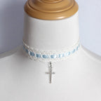 This Cross Lace Choker Necklace blends Gothic elegance with Lolita sweetness. Decorated with delicate lace and a central cross pendant, it exudes both mystery and charm. Available in white, blue, black, and pink, it adapts to different moods and outfits. Perfect for Gothic, Lolita, or vintage-inspired styles, this versatile accessory adds a graceful yet bold touch to any look, making it ideal for parties, cosplay, or daily wear.