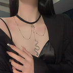 This Dark Lolita Cyberpunk Gothic Snake Necklace blends mysterious elegance with bold punk energy. The unique serpent design symbolizes strength and rebellion, while its sleek metallic finish adds a futuristic Y2K edge. Perfect for Gothic, punk, or alternative styles, it enhances any outfit with a touch of daring attitude. Ideal for parties, concerts, or daily wear for girls who love dark aesthetics and statement accessories.