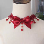This Lolita Lace Bowknot Pearl Choker Necklace is designed as a versatile accessory to elevate any Lolita look. Featuring delicate lace, dainty pearls, and a sweet bowknot centerpiece, it strikes a balance between elegance and cuteness. The soft yet ornate design makes it perfect for pairing with dresses, from sweet styles to gothic ensembles. Ideal for tea parties, photoshoots, or daily styling, this choker adds a refined touch of Lolita charm.