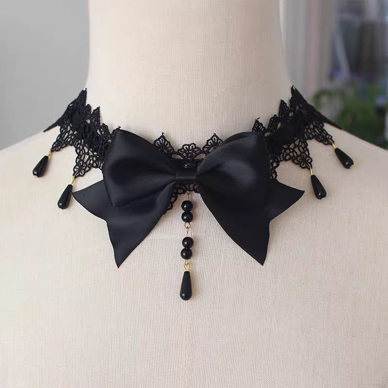 This Lolita Lace Bowknot Pearl Choker Necklace is designed as a versatile accessory to elevate any Lolita look. Featuring delicate lace, dainty pearls, and a sweet bowknot centerpiece, it strikes a balance between elegance and cuteness. The soft yet ornate design makes it perfect for pairing with dresses, from sweet styles to gothic ensembles. Ideal for tea parties, photoshoots, or daily styling, this choker adds a refined touch of Lolita charm.