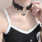 This Lolita Punk Cat Claw Leather Choker Necklace brings an edgy subcultural flair to Lolita fashion. Crafted in sleek leather with bold cat claw accents, it balances rebellion with playful detail. Available in both black and white, it suits different moods and styling needs. Perfect for gothic, punk, or alternative Lolita outfits, this choker adds a fierce yet stylish touch, making it an eye-catching accessory for parties, cosplay, or themed gatherings.