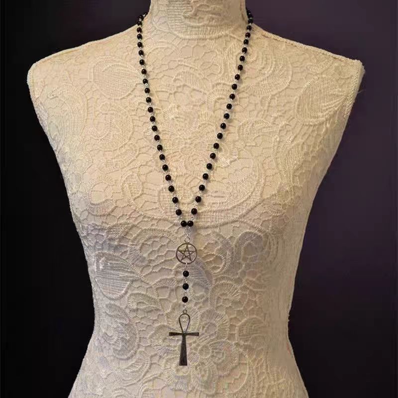 This Lolita Punk Gothic Cross Black Choker captures the essence of dark elegance and rebellious style. Made with soft lace and adorned with a striking cross pendant, it creates a bold statement for Halloween, cosplay, or subculture-inspired outfits. The adjustable design ensures comfort while enhancing any Gothic or Lolita coordinate. Perfect for parties, photo shoots, or daily wear for those who embrace unique fashion with a mysterious edge.