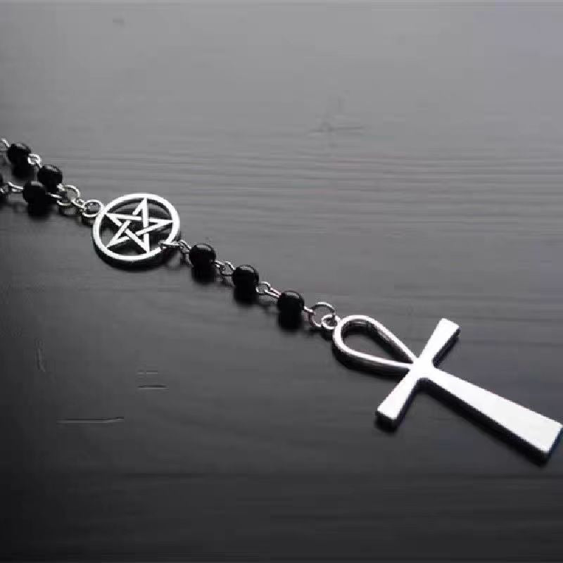 This Lolita Punk Gothic Cross Black Choker captures the essence of dark elegance and rebellious style. Made with soft lace and adorned with a striking cross pendant, it creates a bold statement for Halloween, cosplay, or subculture-inspired outfits. The adjustable design ensures comfort while enhancing any Gothic or Lolita coordinate. Perfect for parties, photo shoots, or daily wear for those who embrace unique fashion with a mysterious edge.