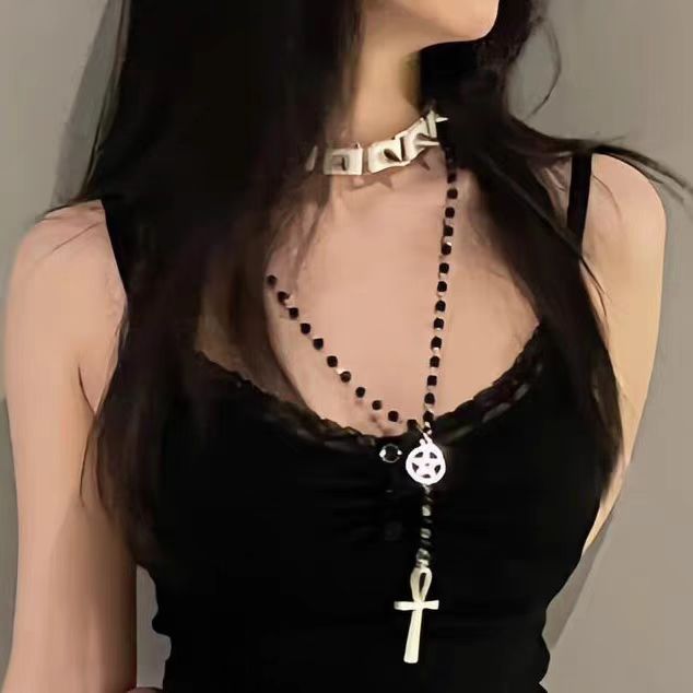 This Lolita Punk Gothic Cross Black Choker captures the essence of dark elegance and rebellious style. Made with soft lace and adorned with a striking cross pendant, it creates a bold statement for Halloween, cosplay, or subculture-inspired outfits. The adjustable design ensures comfort while enhancing any Gothic or Lolita coordinate. Perfect for parties, photo shoots, or daily wear for those who embrace unique fashion with a mysterious edge.