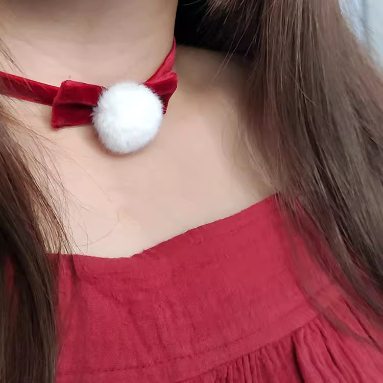 This Lolita Velvet Bowknot Choker Necklace is designed to bring festive elegance with a touch of sweetness. Crafted in rich wine red velvet, it features a delicate bowknot that highlights the neckline with charm and grace. Perfect for Christmas styling, maid-inspired looks, or classic Lolita outfits, this choker adds both warmth and sophistication. Lightweight and versatile, it makes an ideal accessory for holiday parties, tea gatherings, or themed photoshoots.