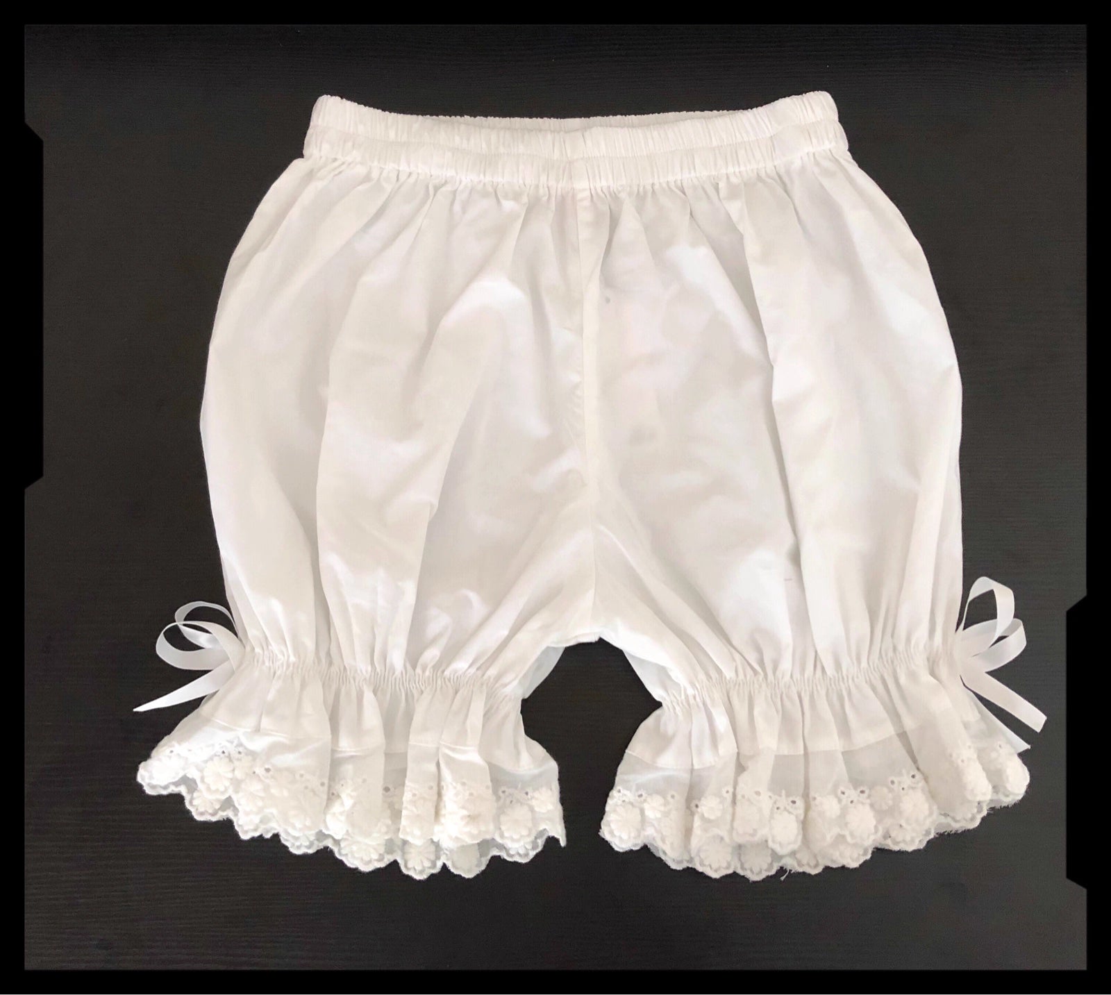 Design Concept:
These Lolita-style shorts are designed as lightweight, breathable innerwear to provide both comfort and modesty. Made from soft cotton and adorned with delicate lace, they ensure a secure anti-see-through layer under skirts or dresses. Available in black and white, these shorts combine practicality with Japanese-inspired Lolita aesthetics, making them ideal for daily wear, casual outings, or layered summer outfits.