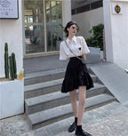 Design Concept:
This Lolita skirt in black features an irregular hemline with a high-waist A-line puffed silhouette, designed to flatter the figure while offering a playful, elegant look. The voluminous shape helps conceal hips naturally, combining style and comfort for daily wear, tea parties, or casual Lolita gatherings. Crafted from soft, breathable fabric, it maintains structure while allowing easy movement, making it a versatile addition to any Lolita wardrobe.