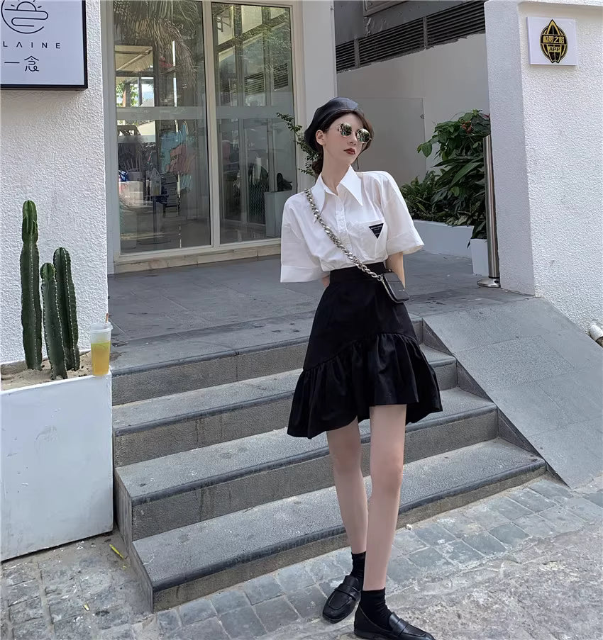 Design Concept:
This Lolita skirt in black features an irregular hemline with a high-waist A-line puffed silhouette, designed to flatter the figure while offering a playful, elegant look. The voluminous shape helps conceal hips naturally, combining style and comfort for daily wear, tea parties, or casual Lolita gatherings. Crafted from soft, breathable fabric, it maintains structure while allowing easy movement, making it a versatile addition to any Lolita wardrobe.