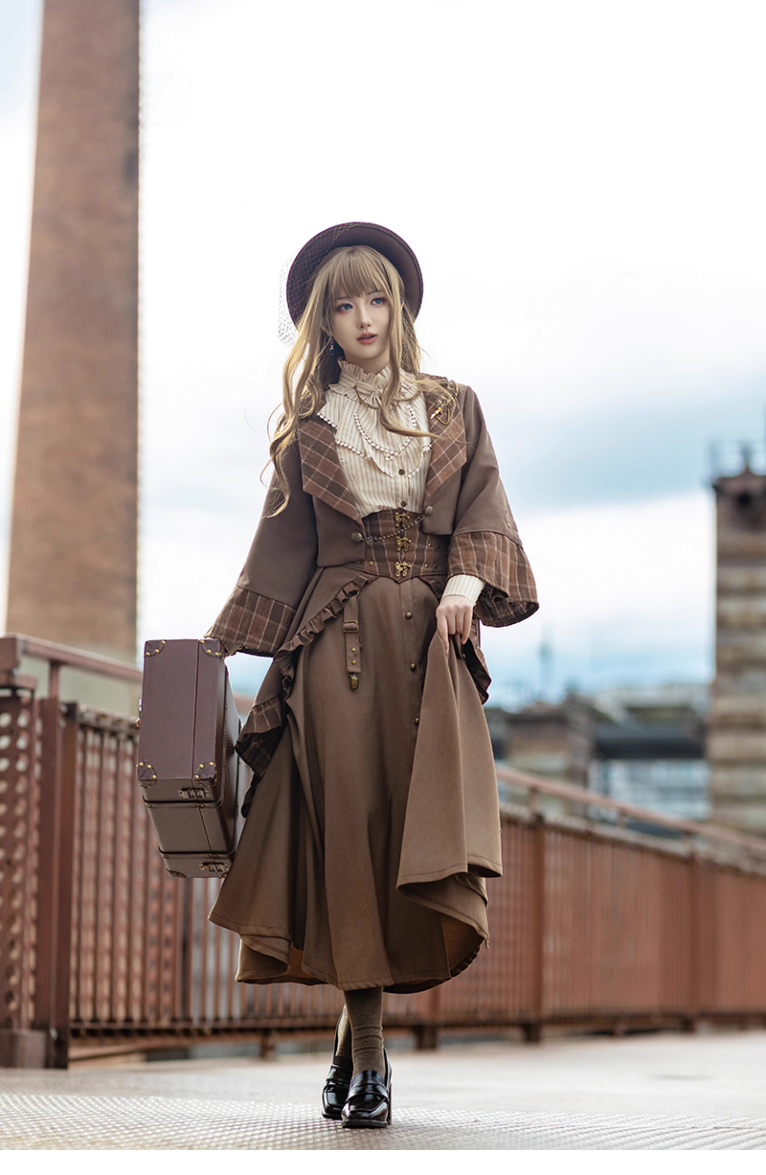 Design Concept:
This Lolita skirt in brown features a charming lace-trimmed plaid design and a flattering A-line silhouette, combining vintage elegance with playful Lolita style. The high-waist cut enhances the figure while the flowing fabric ensures comfort, making it perfect for daily wear, tea parties, or casual Lolita gatherings. Its intricate lace details and plaid pattern add a sophisticated yet whimsical touch to any outfit.