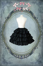 Design Concept:
This Gothic Lolita skirt, made from soft cotton, showcases a layered cake silhouette adorned with delicate ruffled hems, available in black and white. The tiered design adds playful volume while maintaining an elegant charm, making it perfect for daily wear, tea parties, or casual Lolita gatherings.