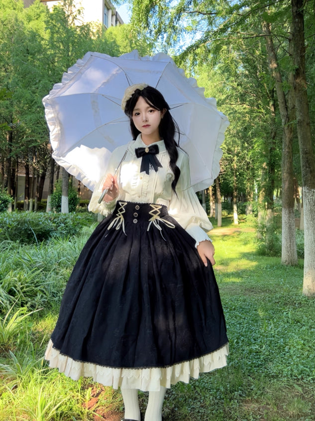 This Lolita high-waist skirt features a vintage CLA-inspired court style, combining elegance with classic Lolita charm. The structured silhouette and refined tailoring create a graceful look, perfect for layering with blouses or wearing as a statement piece. Designed in black, it adds sophistication and versatility to any Lolita wardrobe.