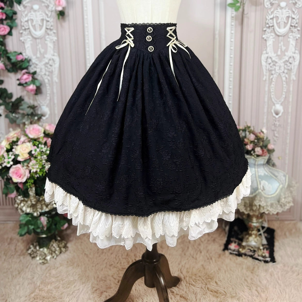 This Lolita high-waist skirt features a vintage CLA-inspired court style, combining elegance with classic Lolita charm. The structured silhouette and refined tailoring create a graceful look, perfect for layering with blouses or wearing as a statement piece. Designed in black, it adds sophistication and versatility to any Lolita wardrobe.