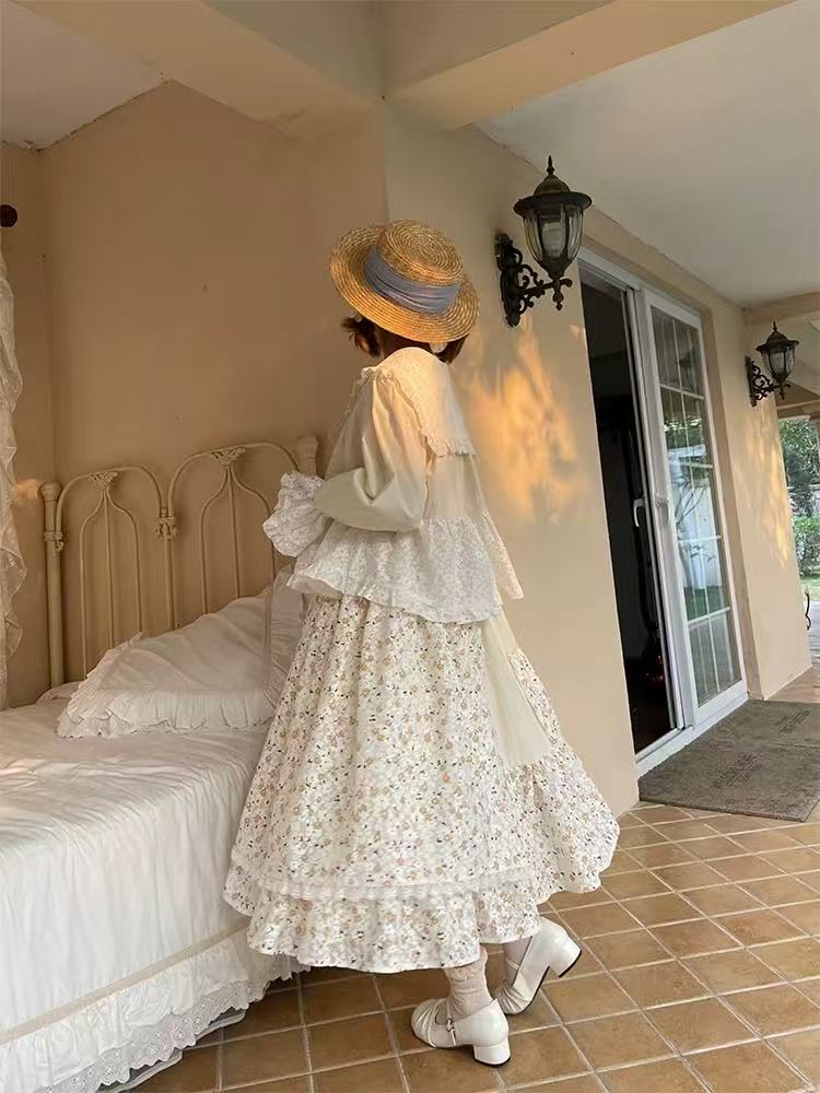 Design Concept:
This Lolita skirt features a charming patchwork design in soft apricot and delicate blue hues, adorned with floral prints and lace trim. The high-waisted silhouette and layered construction create a playful yet elegant princess look, perfect for daily wear, tea parties, or casual Lolita gatherings. The lightweight, breathable fabric ensures comfort while maintaining the skirt’s structured, whimsical shape.
